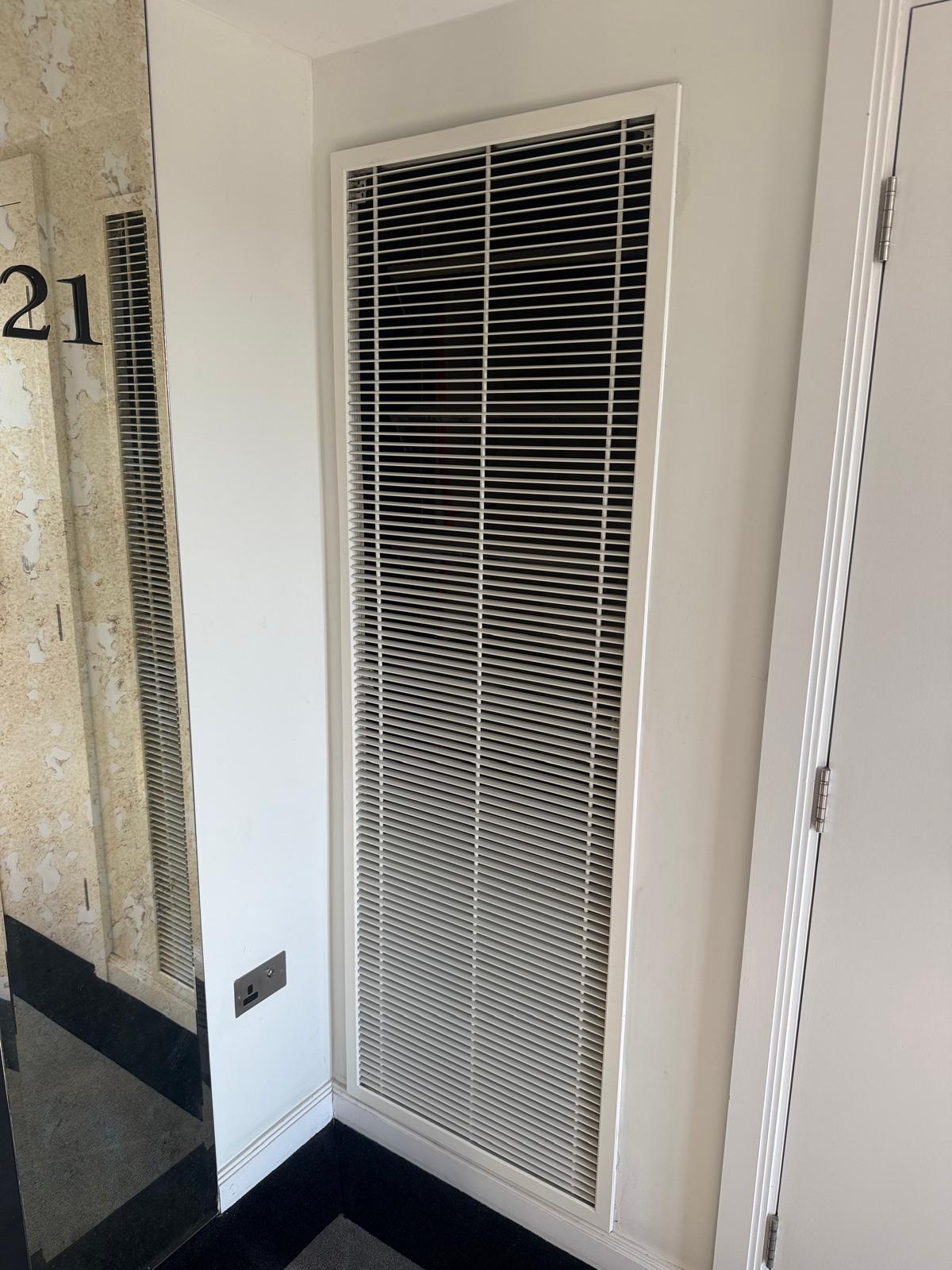 mechanical smoke ventilation grille during AOV maintenance in Barking, Essex