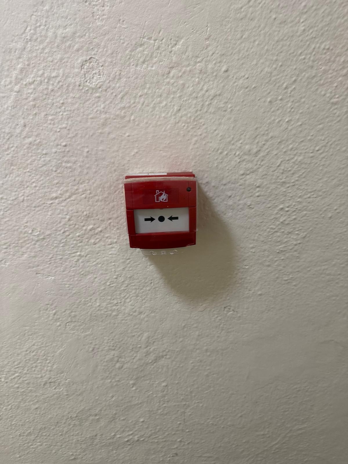 manual fire alarm call point during six-month fire alarm service in Bermondsey