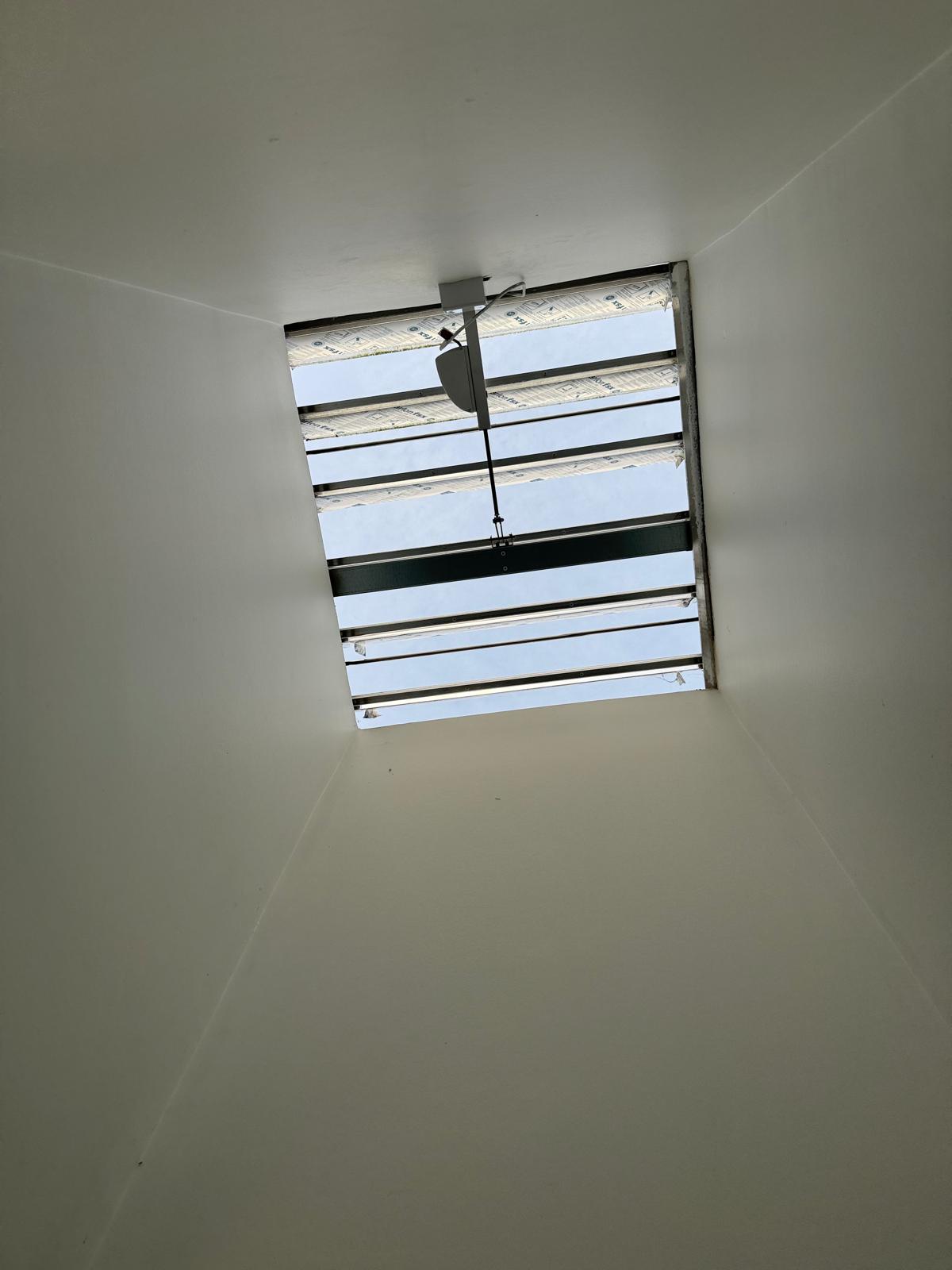 high-level mechanical smoke vent during mechanical AOV maintenance in Bethnal Green, East London