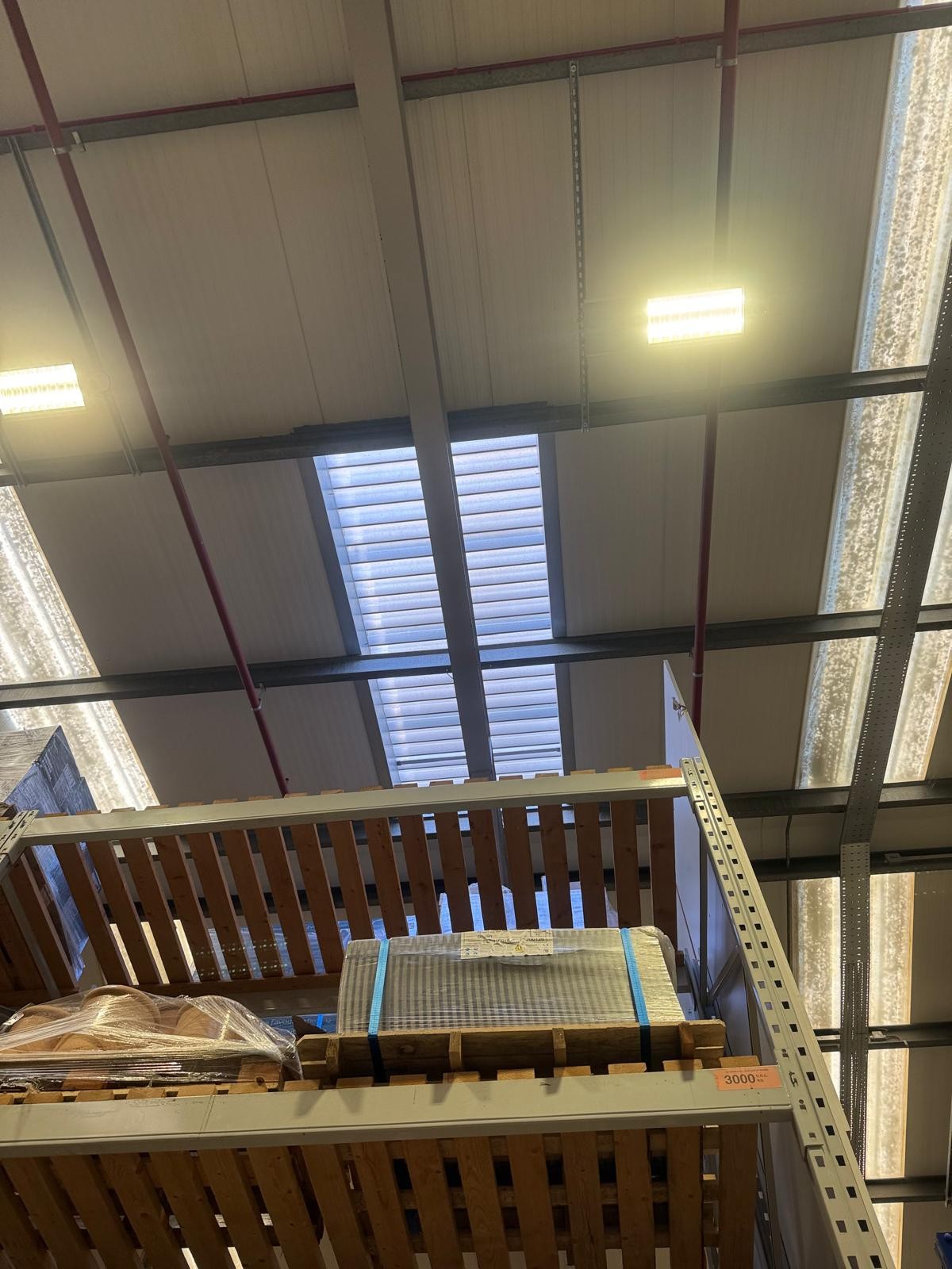 high-level warehouse smoke vents during warehouse roof AOV system maintenance in Charlton