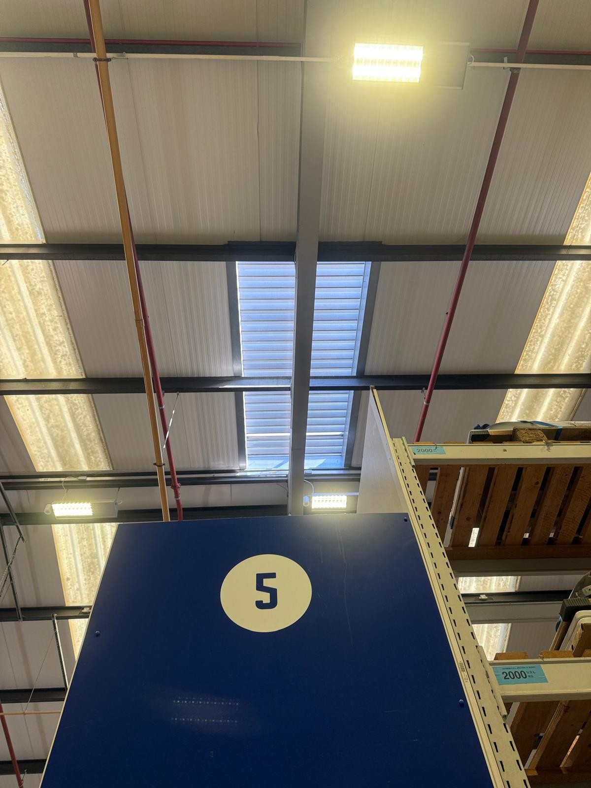 warehouse high-level AOV openings during warehouse roof AOV system maintenance in Charlton